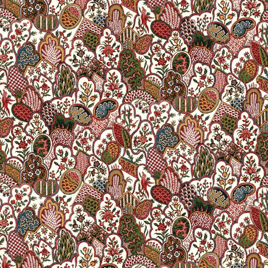 Patterned fabric with intricate designs in red, green, and brown on a white background