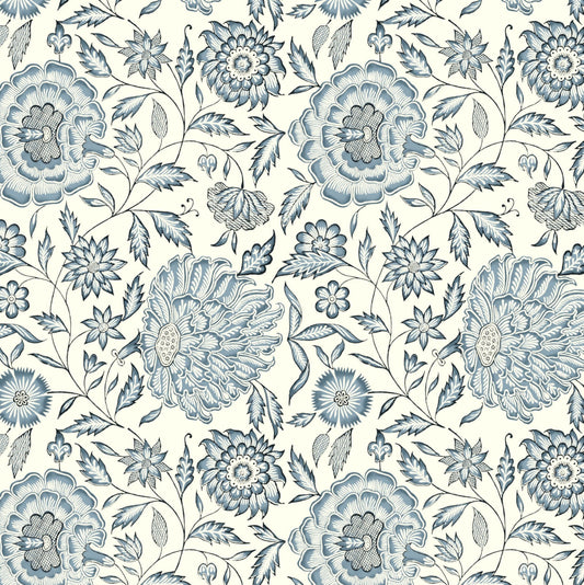 Pattern of blue flowers and leaves on a white background