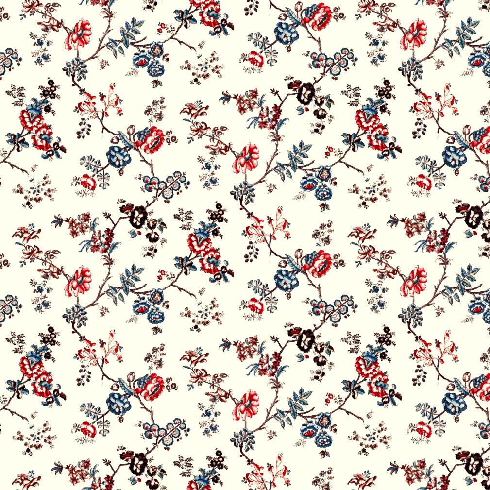 A repeating floral pattern on a warm off-white background, featuring red, blue, and dark brown blossoms and leaves with delicate stems.