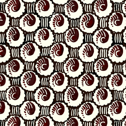 Pattern of white and brown shapes on a black background