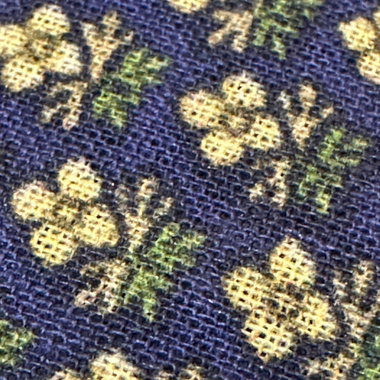Close-up of a fabric with a floral pattern on a blue background