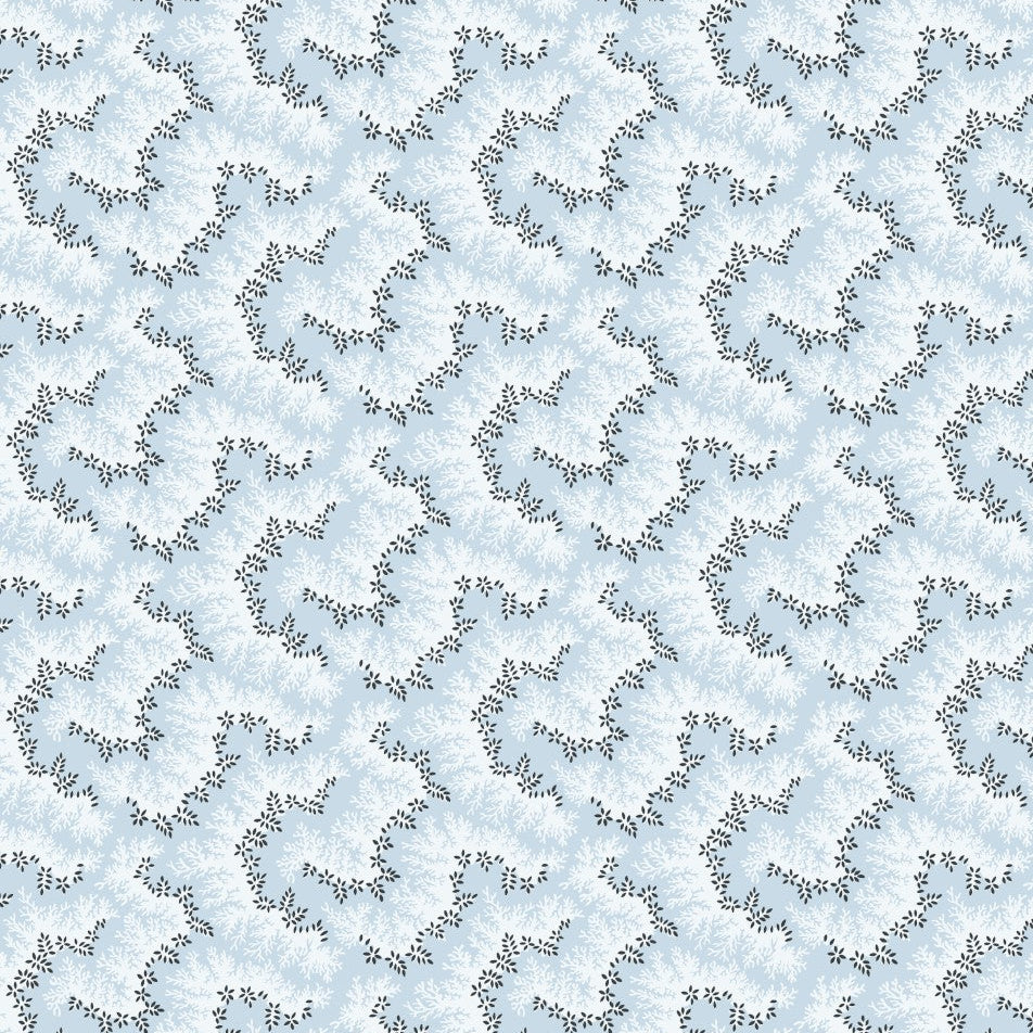 Pattern of deer heads on a light blue background