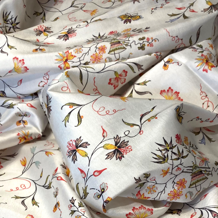 Floral fabric with colorful patterns on a white background