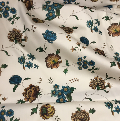 Colourful 18th century historical Cotton fabric design with flowers. The colours are reds, blues and greens.The Block Printed design. Historical Fabric Store.Classical Reproduced Fabrics.Shop historically accurate Fabrics online. Fabrics for historical costuming.Reenactors Authentic Fabrics.